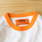 UNIVERSAL OVERALL -
HOT DOG RINGER TEE