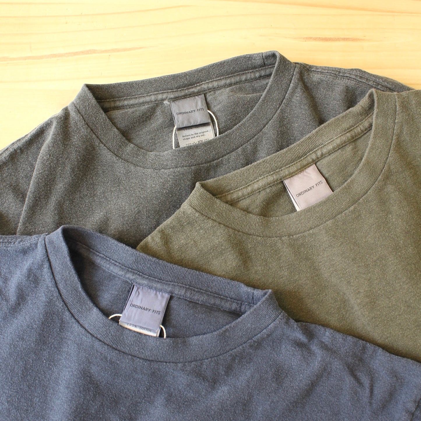 ORDINARY FITS -
PIGMENT DYEING TEE