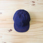 HIGHER - 
BLUE SELVEDGE DENIM CINCH BUCKLE CAP