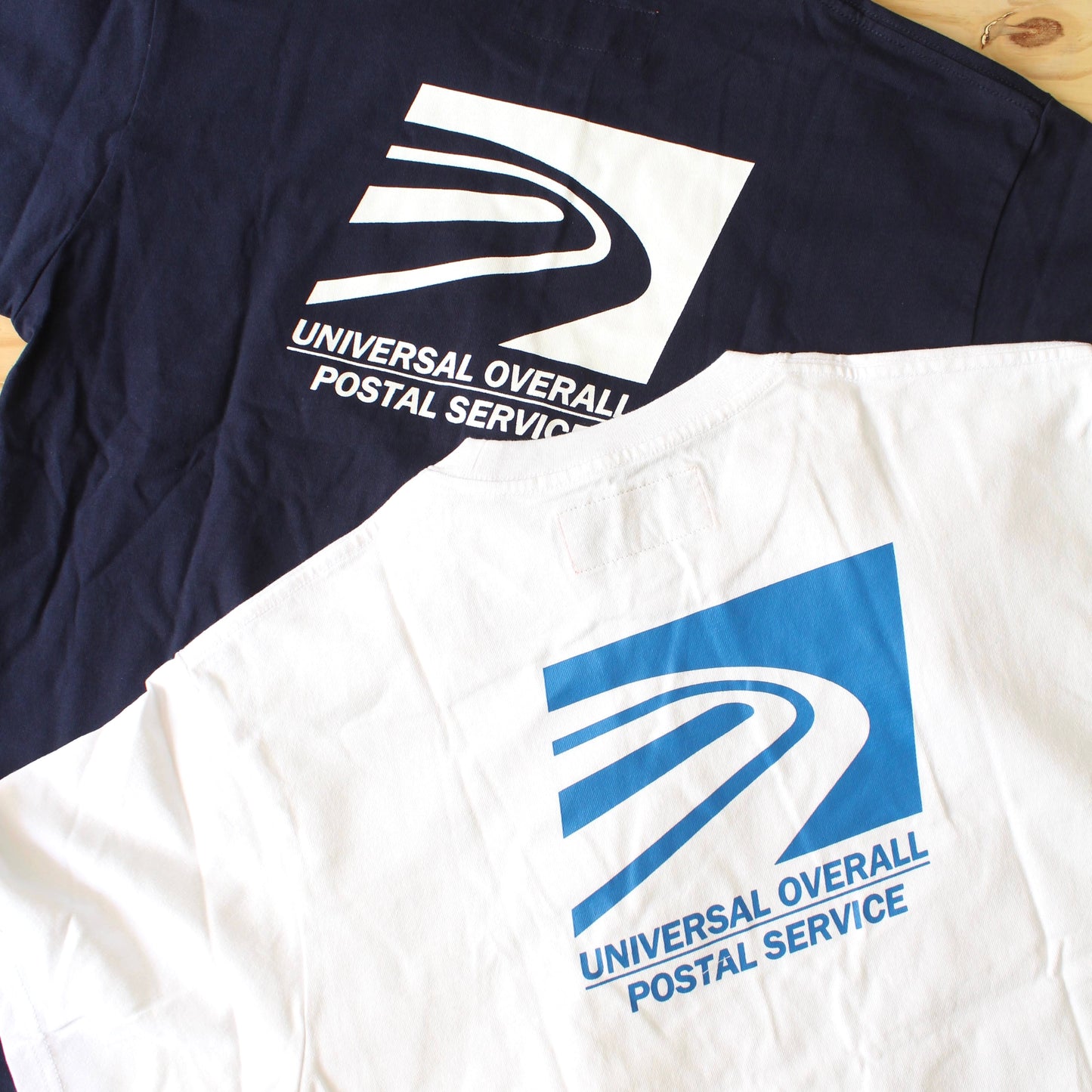 UNIVERSAL OVERALL 日版 - 
POSTAL SERVICE TEE