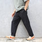 MANUAL ALPHABET -
4WAY NYLON EASY TAPERED PANTS